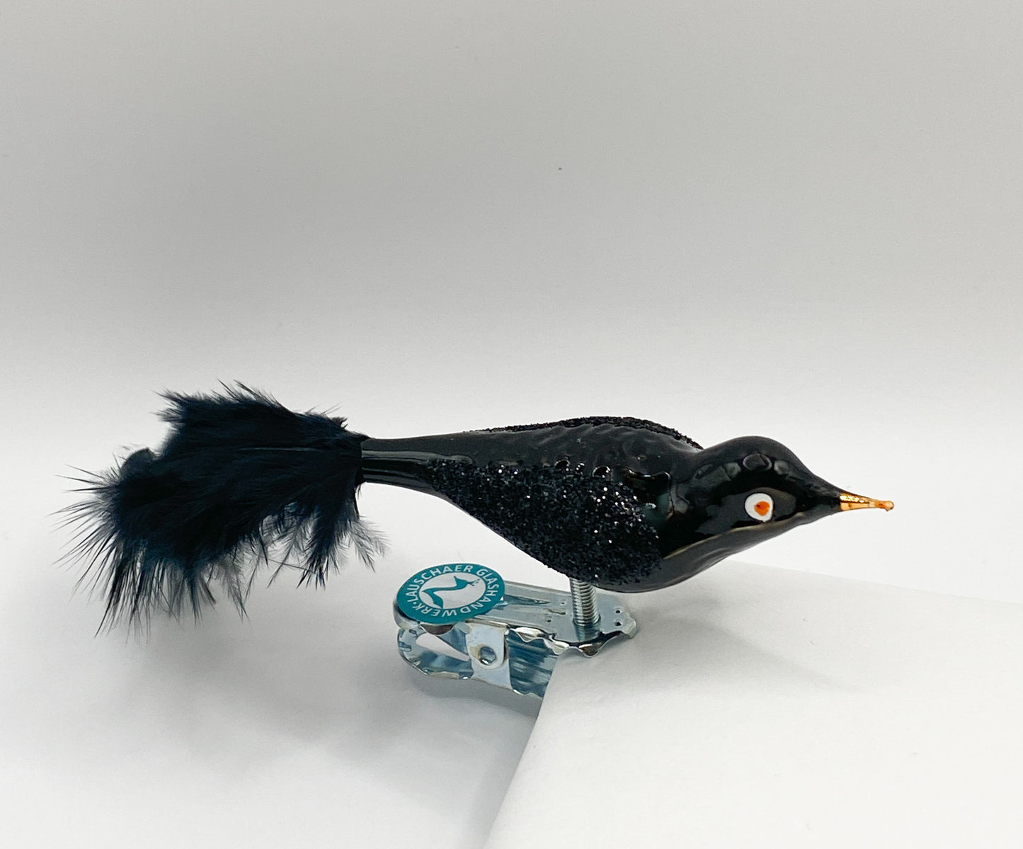 Kleine Glitzer-Amsel