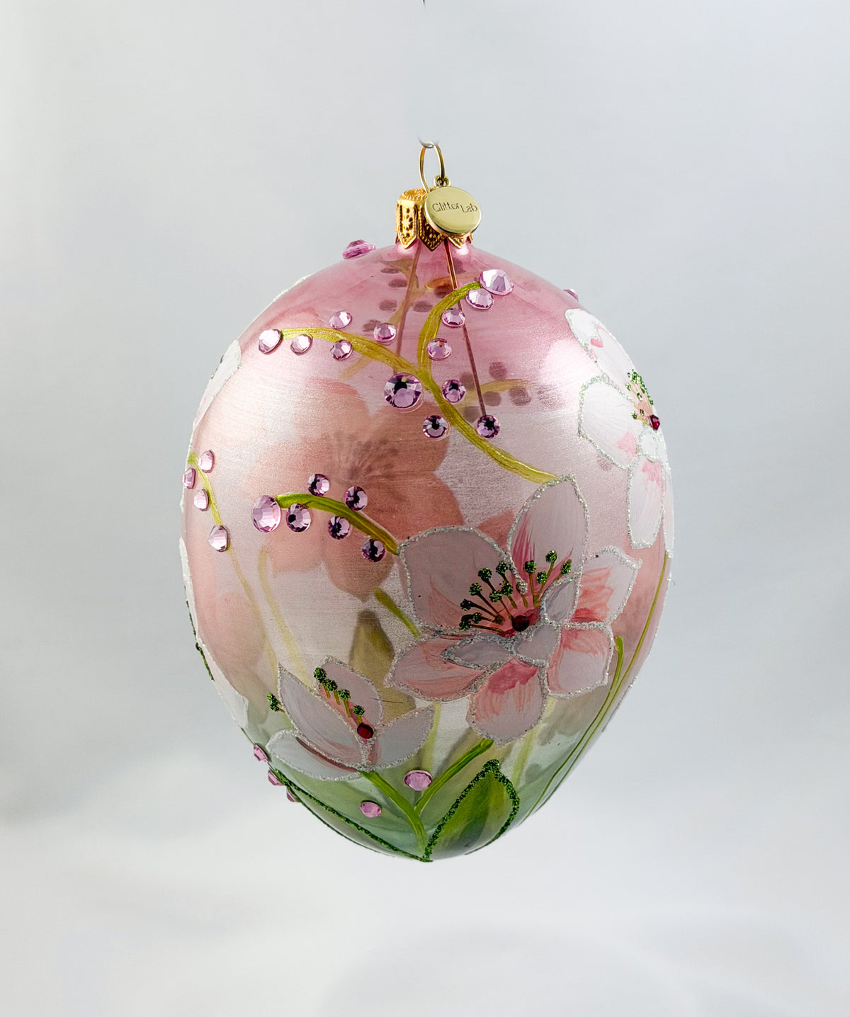 Eiform in Hellrosa transparent mit weissen Blüten und rosa Glitzersteinchen, GlitterLab