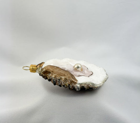 Large open oyster with pearl