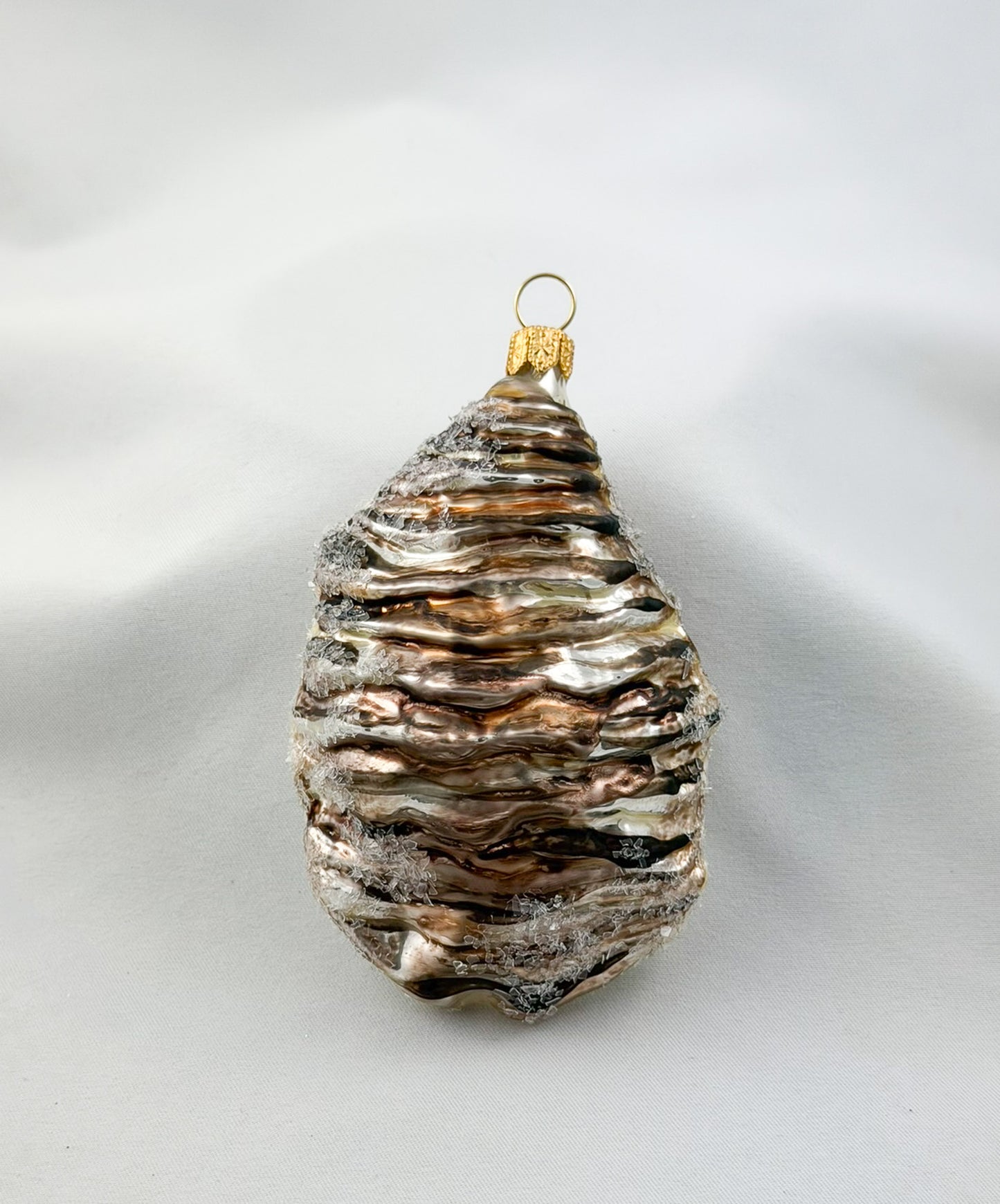 Large open oyster with pearl
