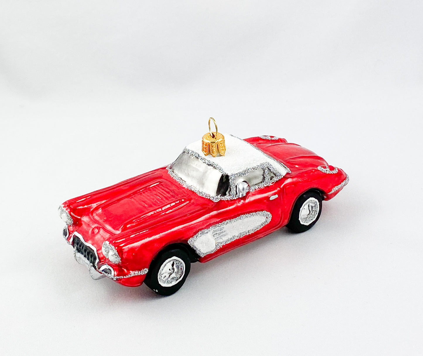 Roter Vintage Cadillac mit weissem Dach