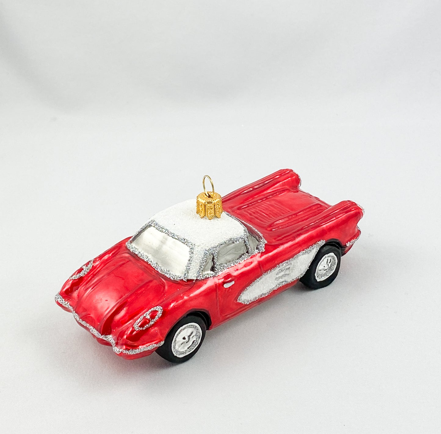 Roter Vintage Cadillac mit weissem Dach