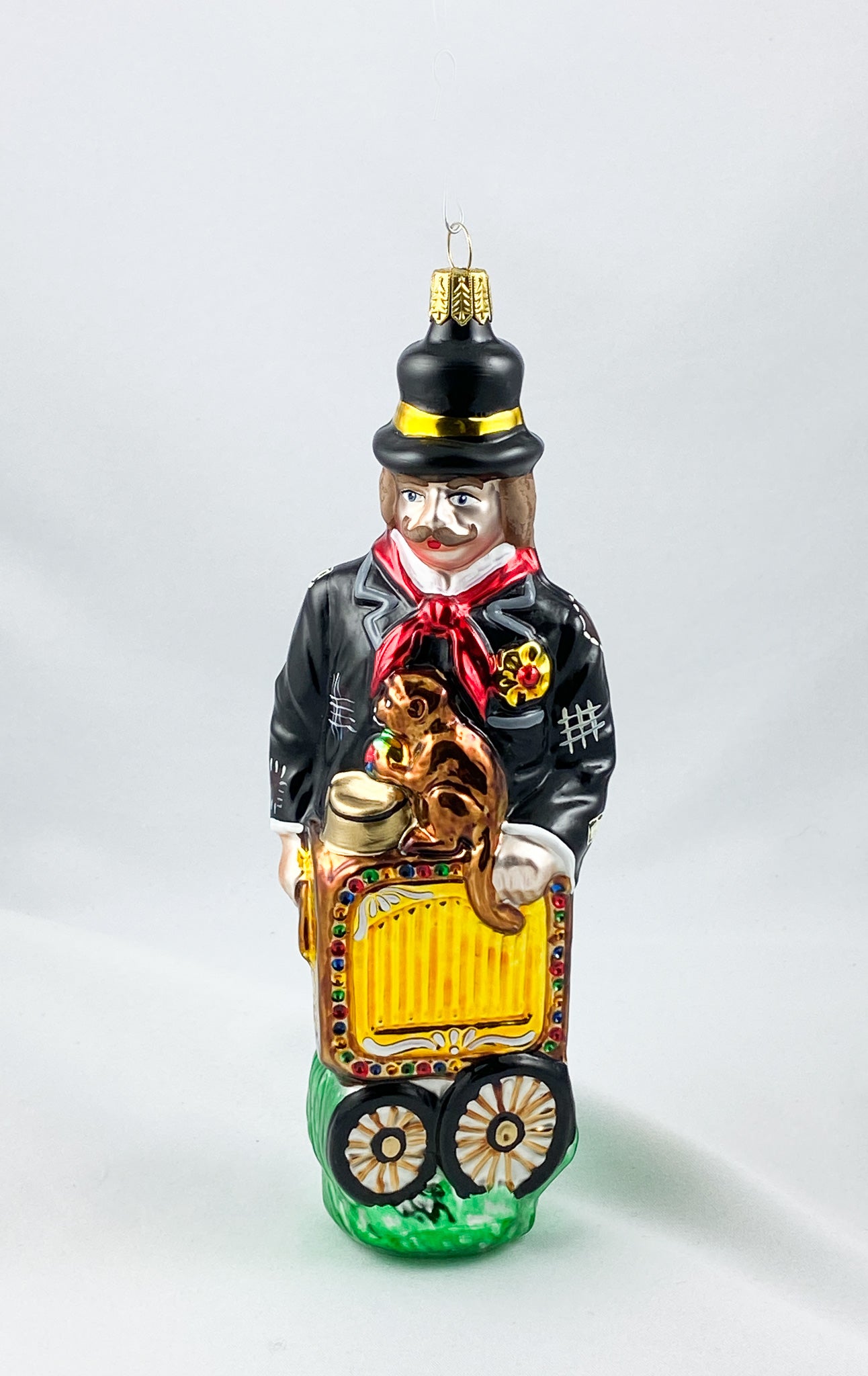 Drehleier -Spieler mit Affe