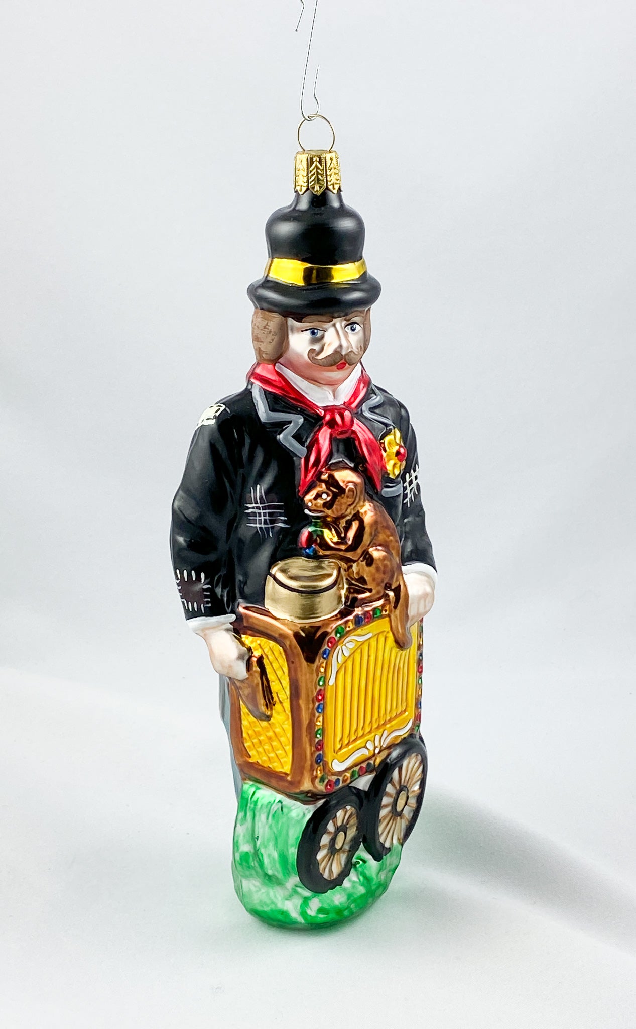 Drehleier -Spieler mit Affe