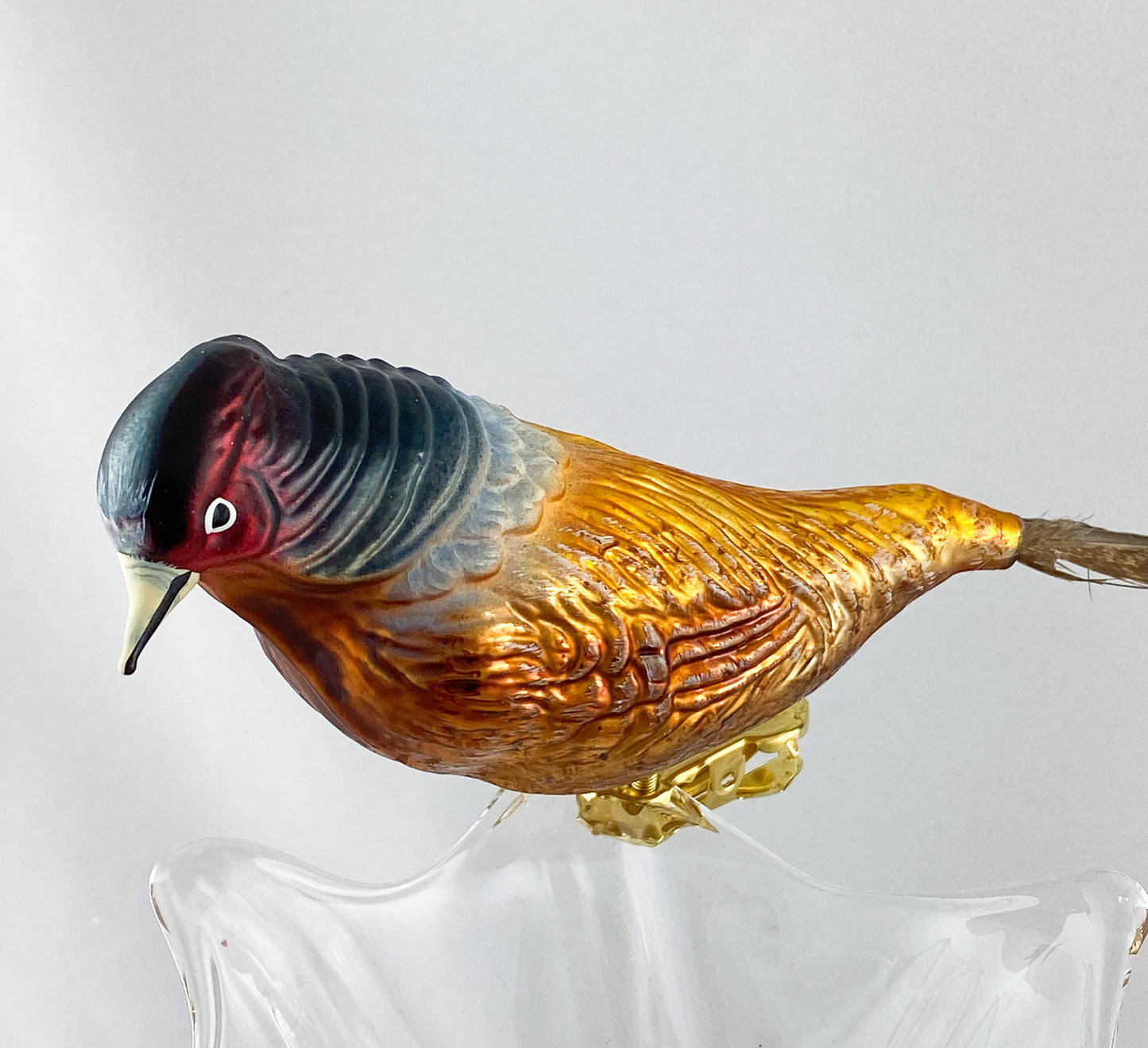 Hunting pheasant with long pheasant feather on clip