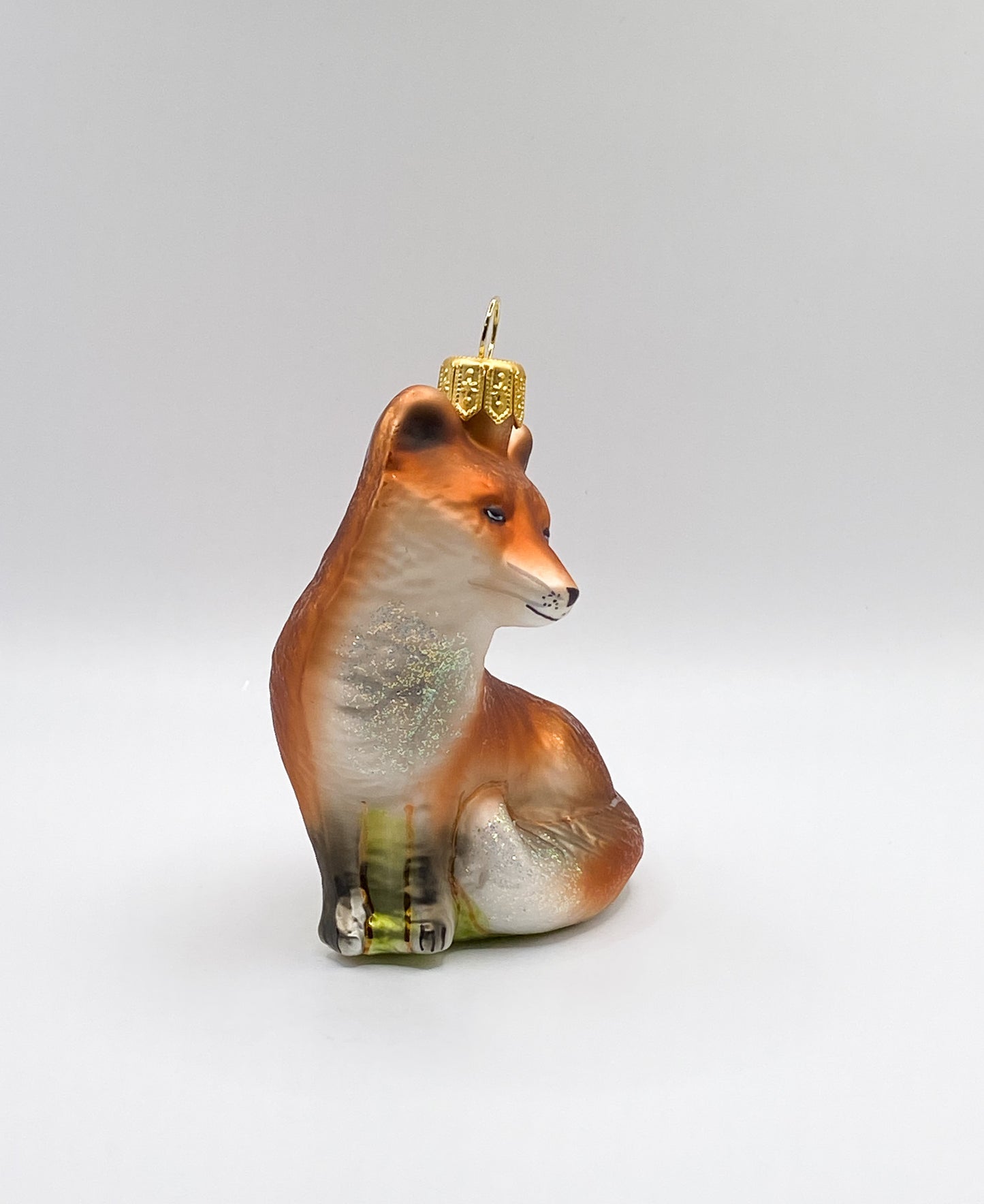 Sitzender verschmitzter Fuchs