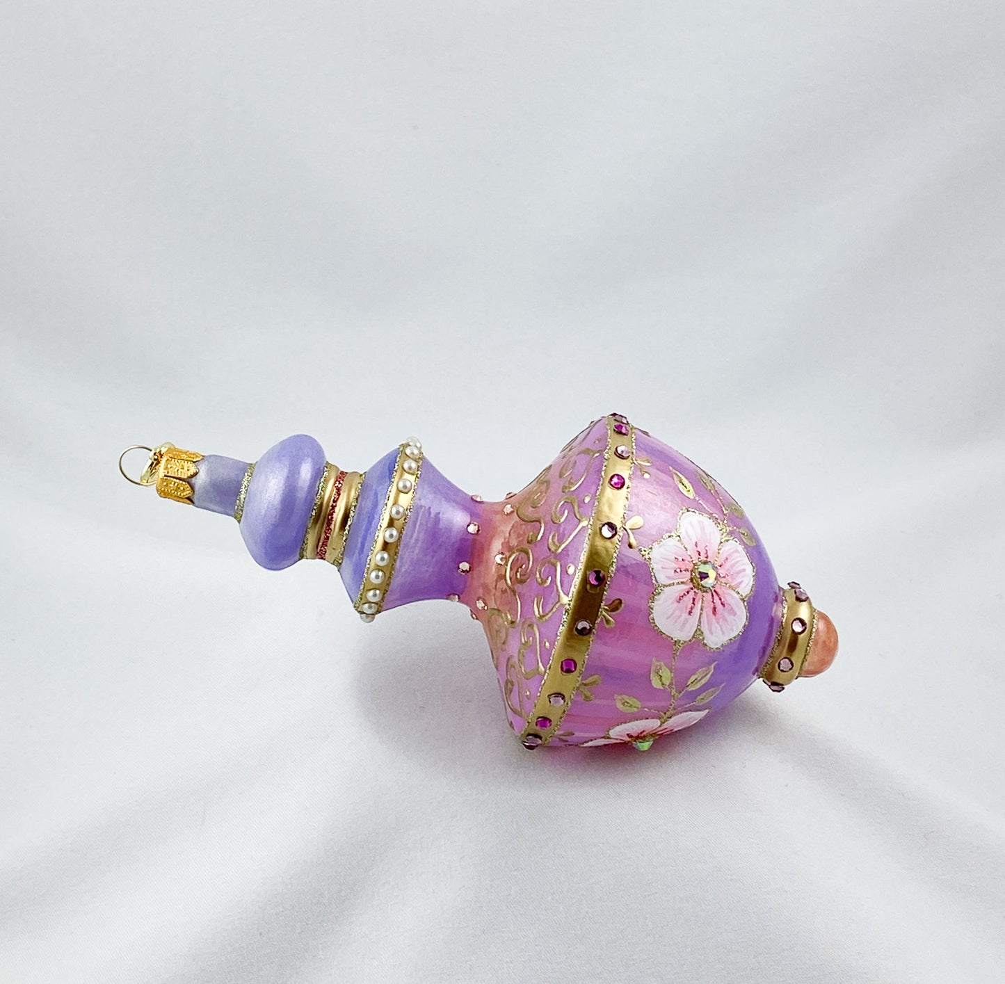 Hourglass shape in lavender and purple with pink flowers and glitter stones, GlitterLab