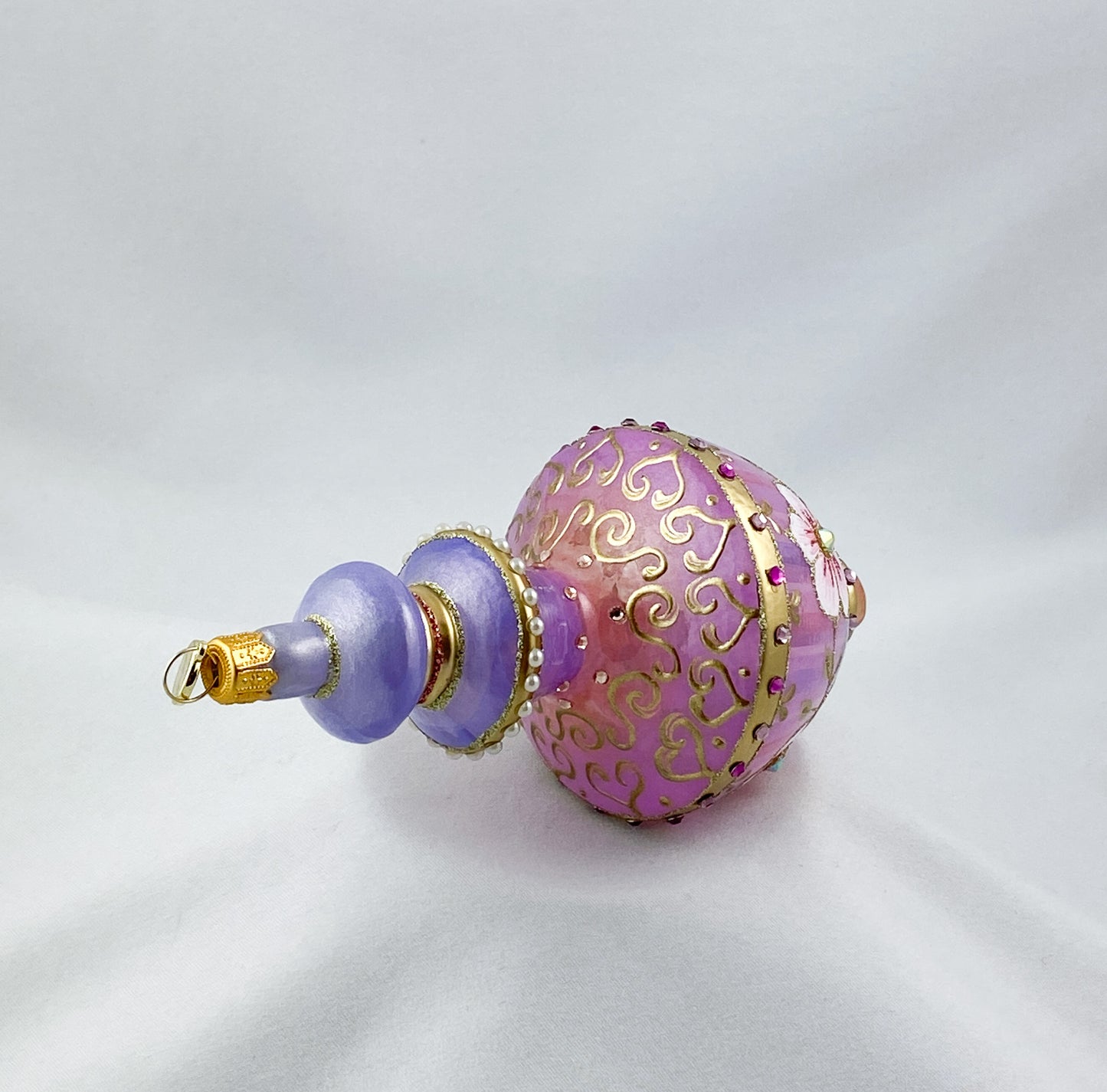 Hourglass shape in lavender and purple with pink flowers and glitter stones, GlitterLab