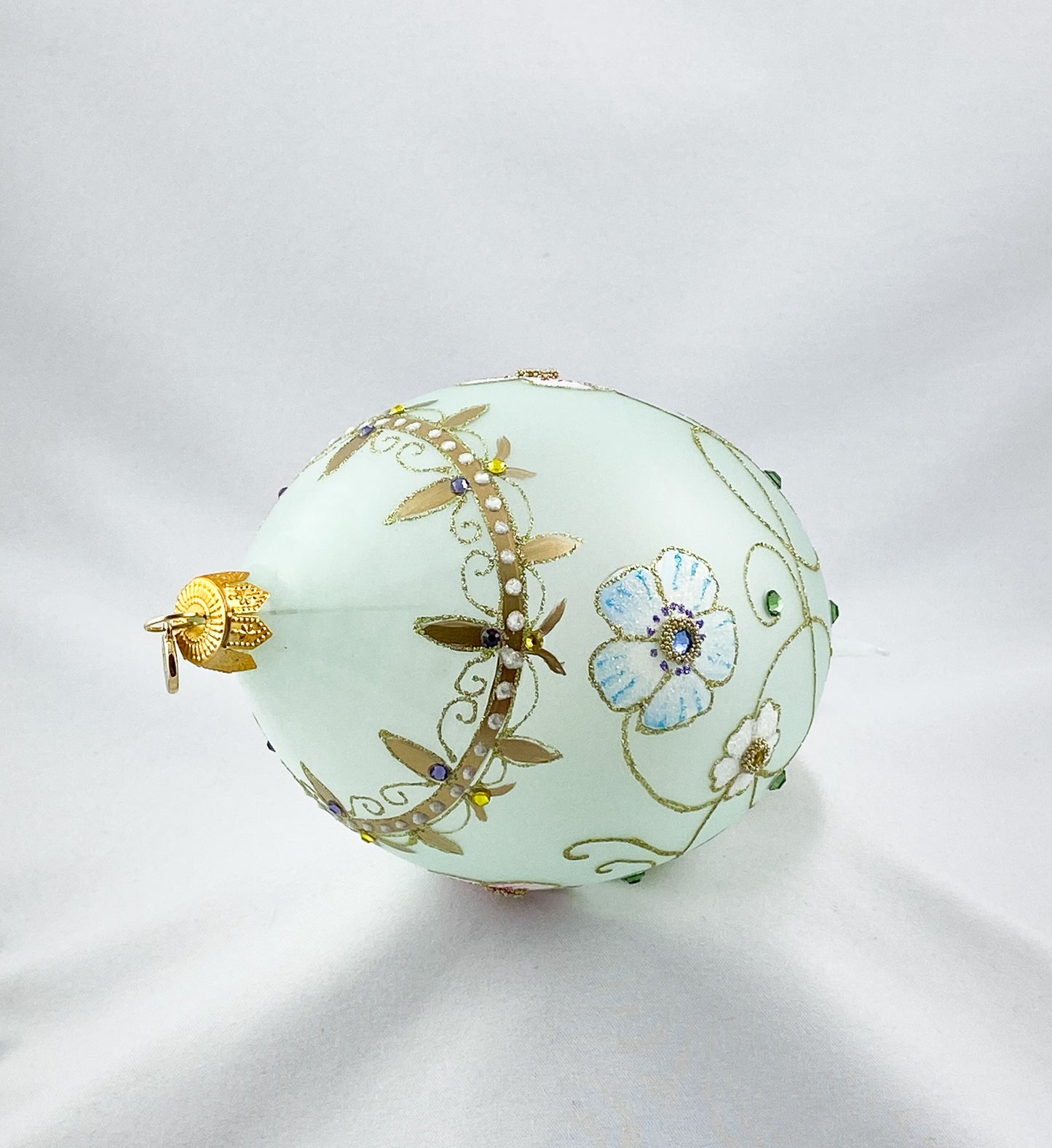 Transparent drop shape in mint with pink and light blue flowers and glitter stones, GlitterLab