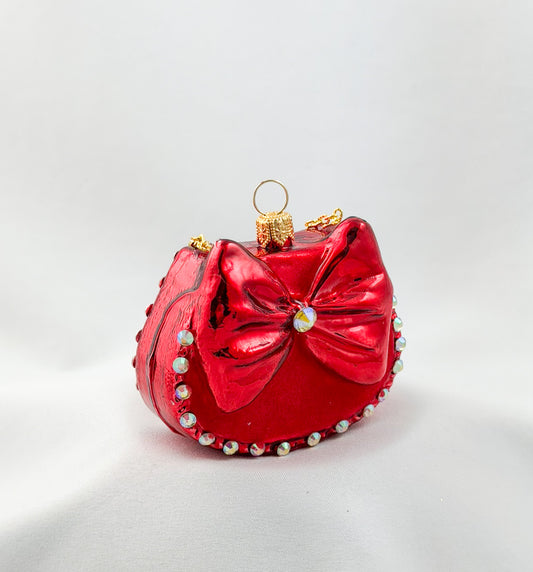 Red women's handbag with bow and glitter stones