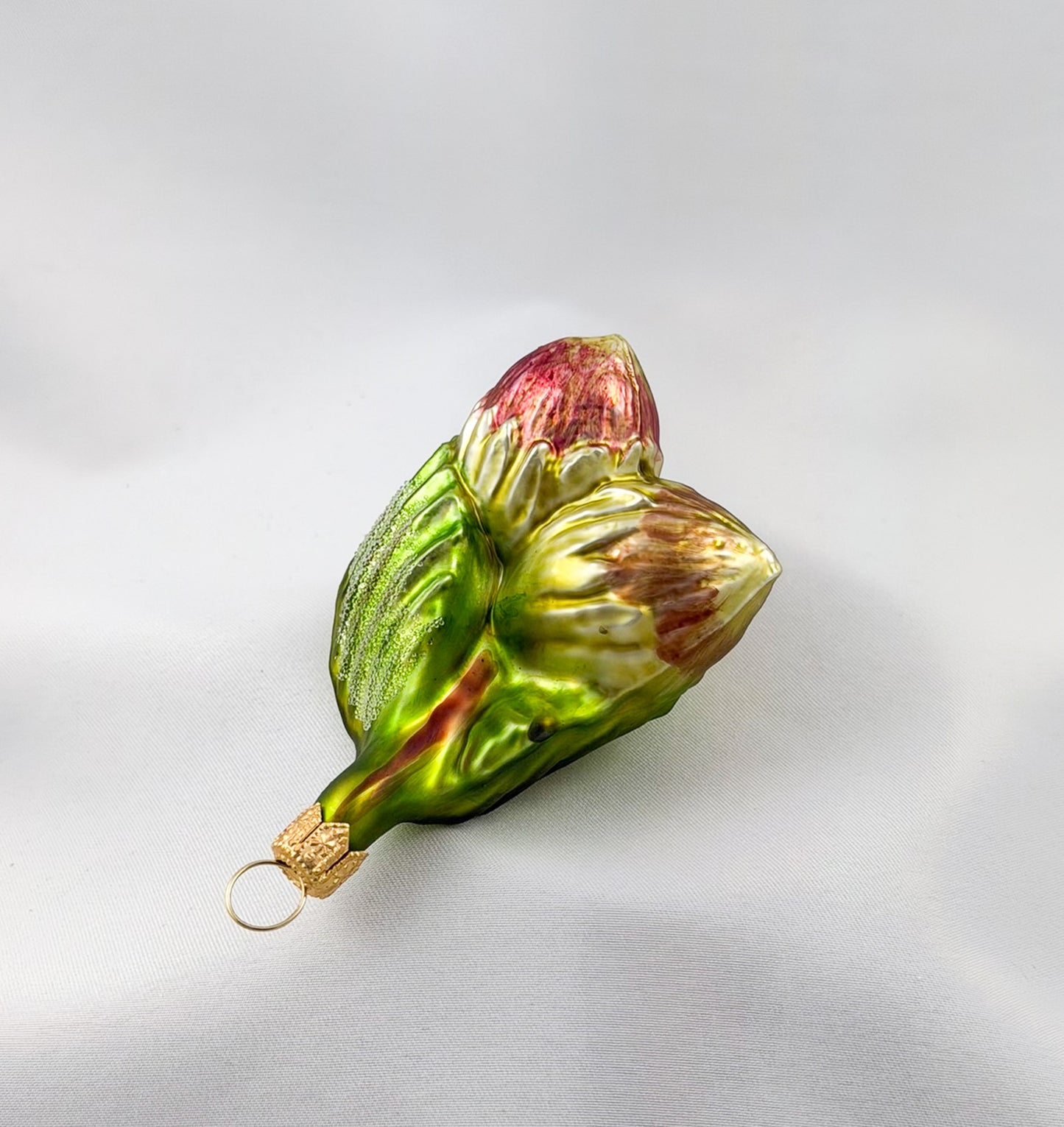 Three hazelnuts on a branch