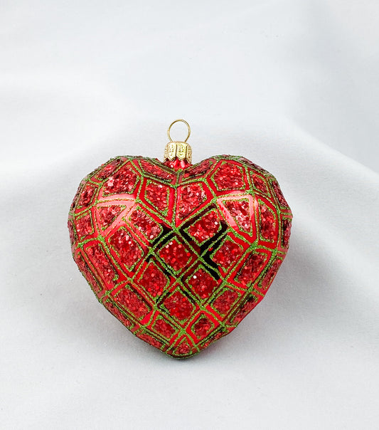 Rotes Herz mit geometrischem Muster und grünem Glitzer