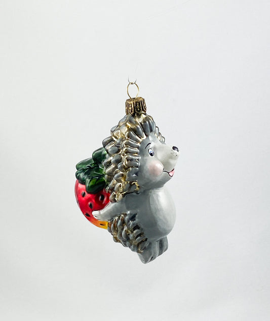 Hedgehog brings a large strawberry AtlasArt