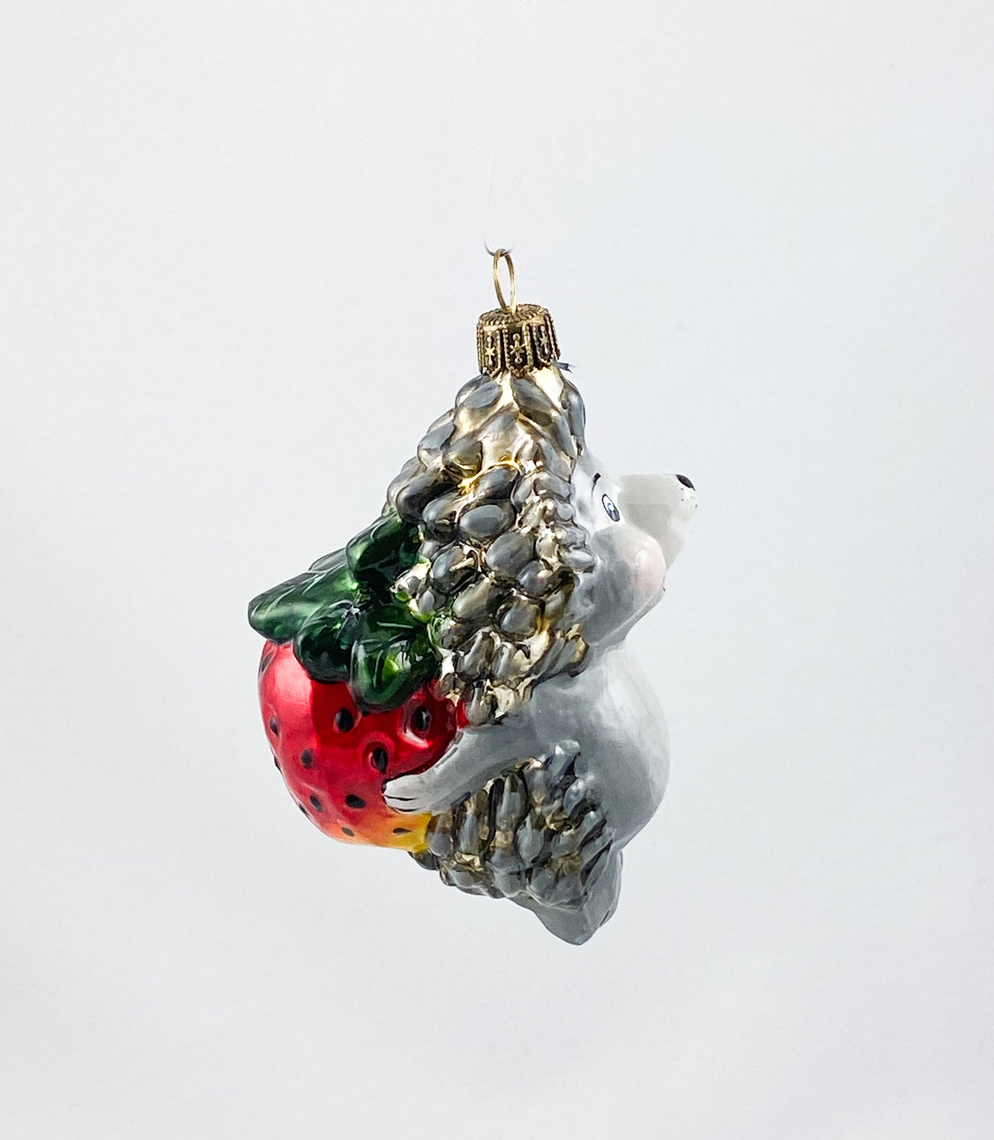 Hedgehog brings a large strawberry AtlasArt