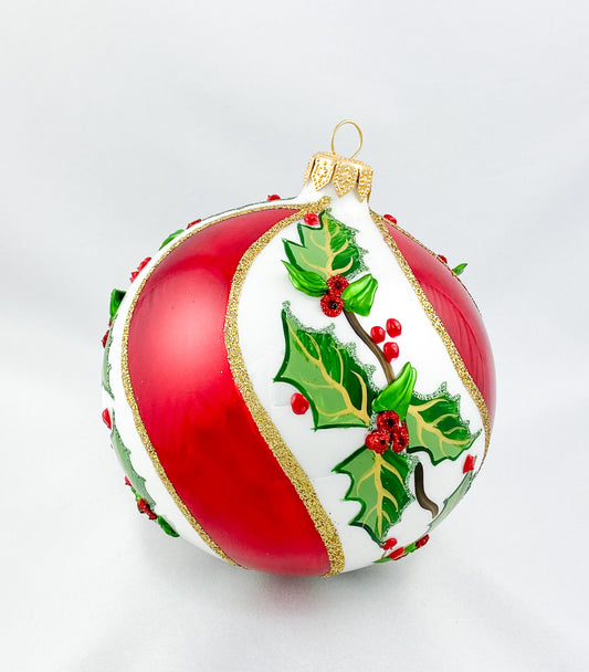 White red diagonally striped ball with holly decoration