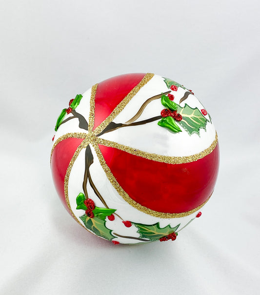 White red diagonally striped ball with holly decoration