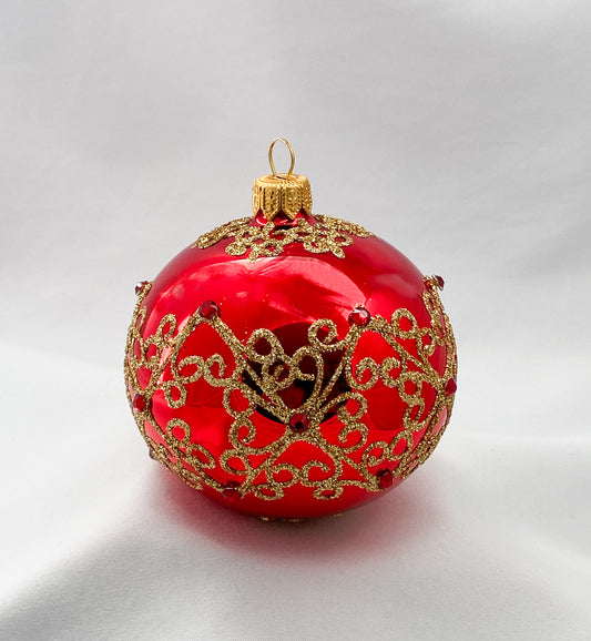 Kugel rot glanz mit goldenem Dekor und roten Schmucksteinen