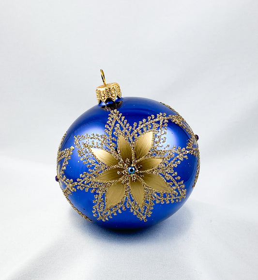Kugel dunkelblau mit goldenem Blütenstern