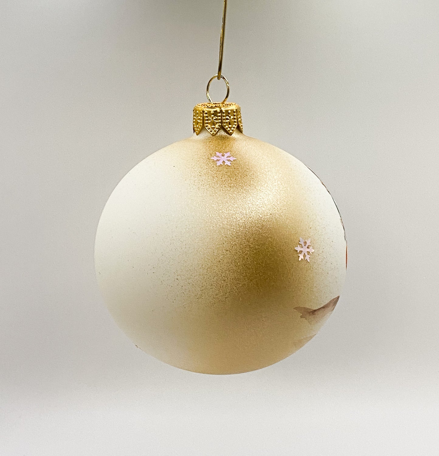 Ball Mama hedgehog shows the little hedgehog the Christmas tree balls