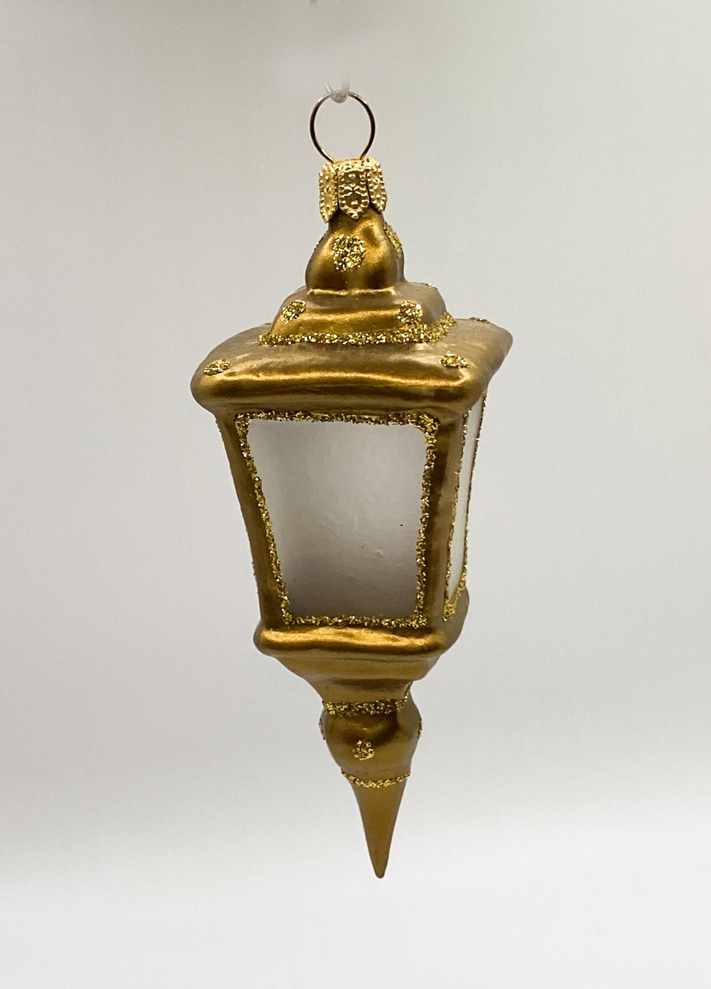 Goldene transparente Laterne