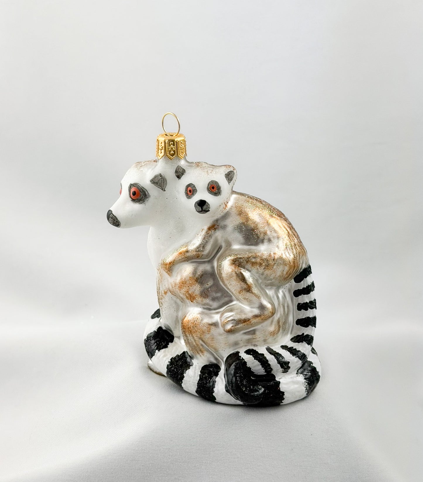 Madagascar lemur with baby on its back