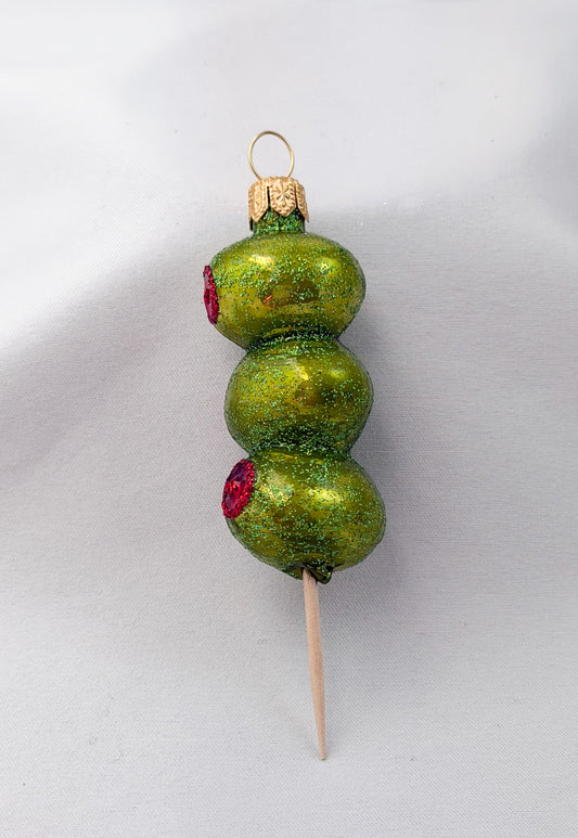 Party nibbles - skewers of stuffed green olives