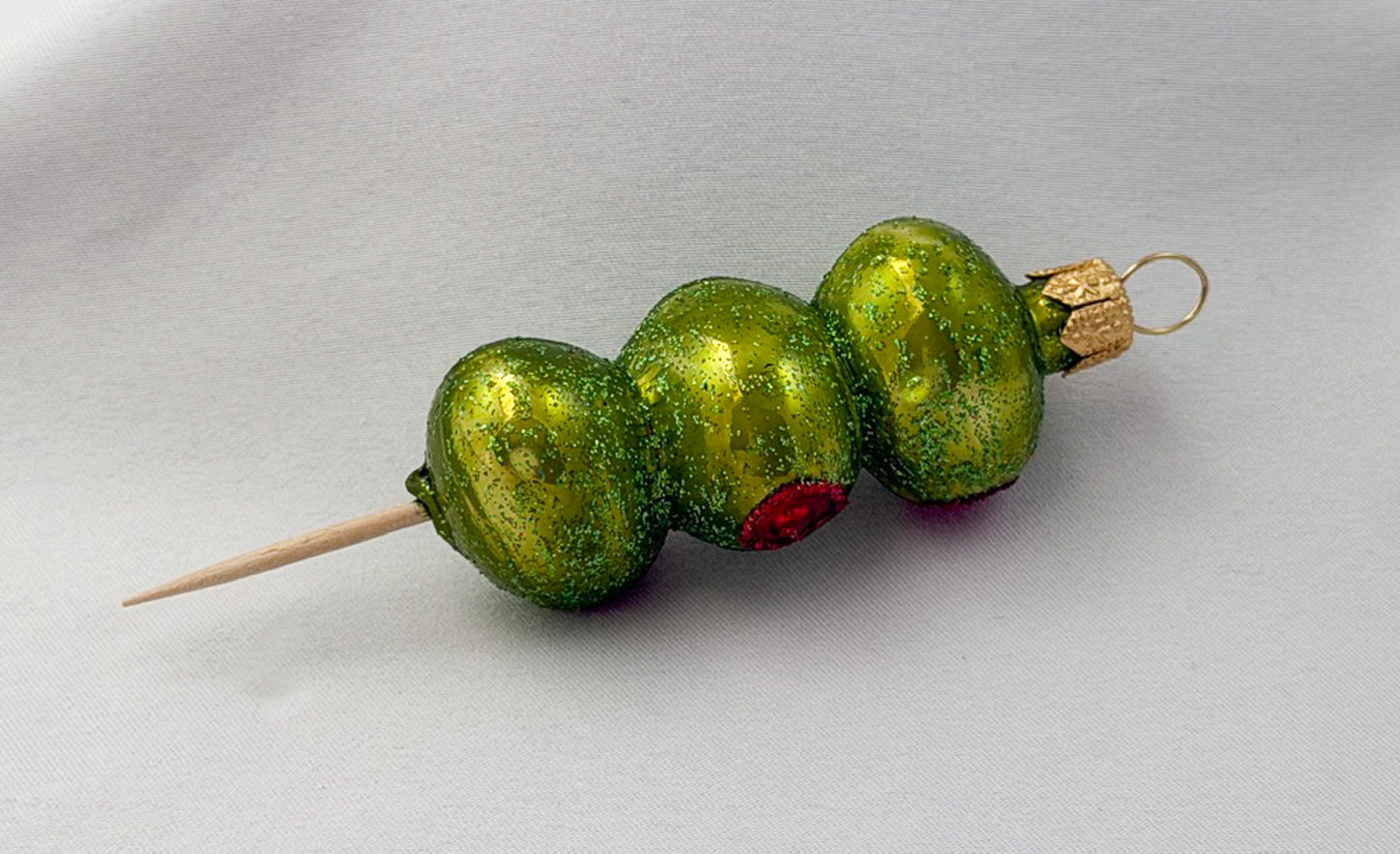 Party nibbles - skewers of stuffed green olives