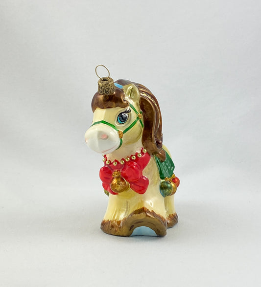 little horse with red ribbon