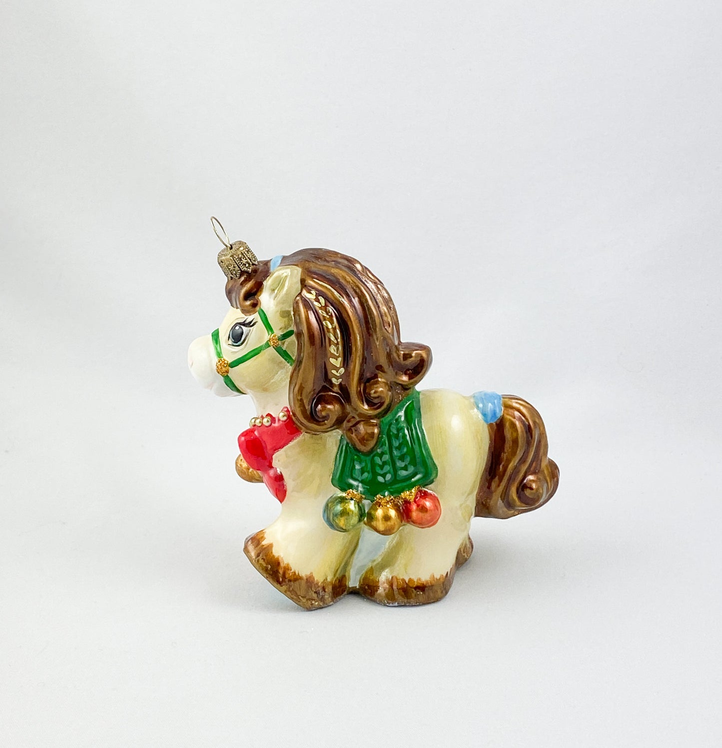 little horse with red ribbon