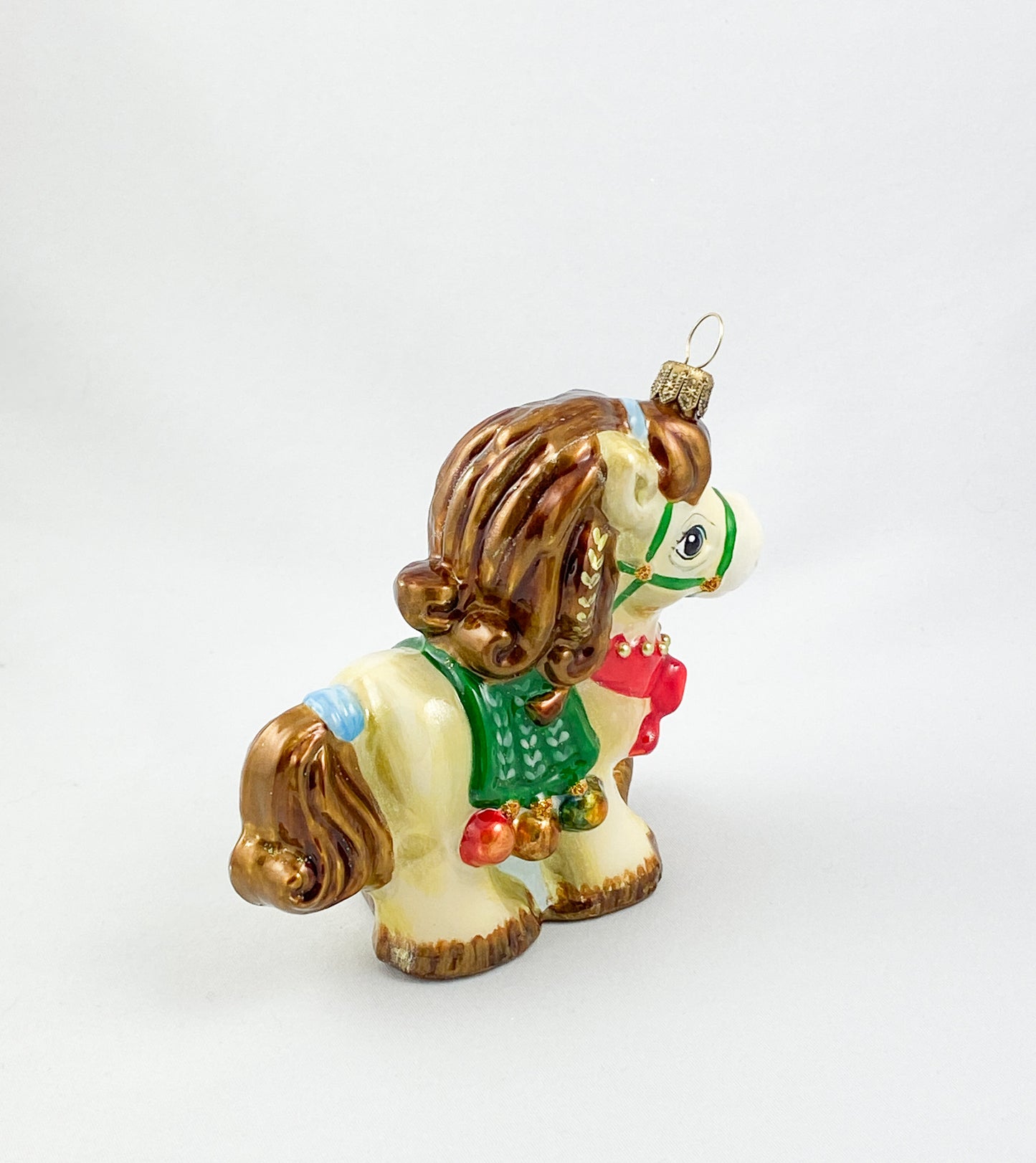 little horse with red ribbon