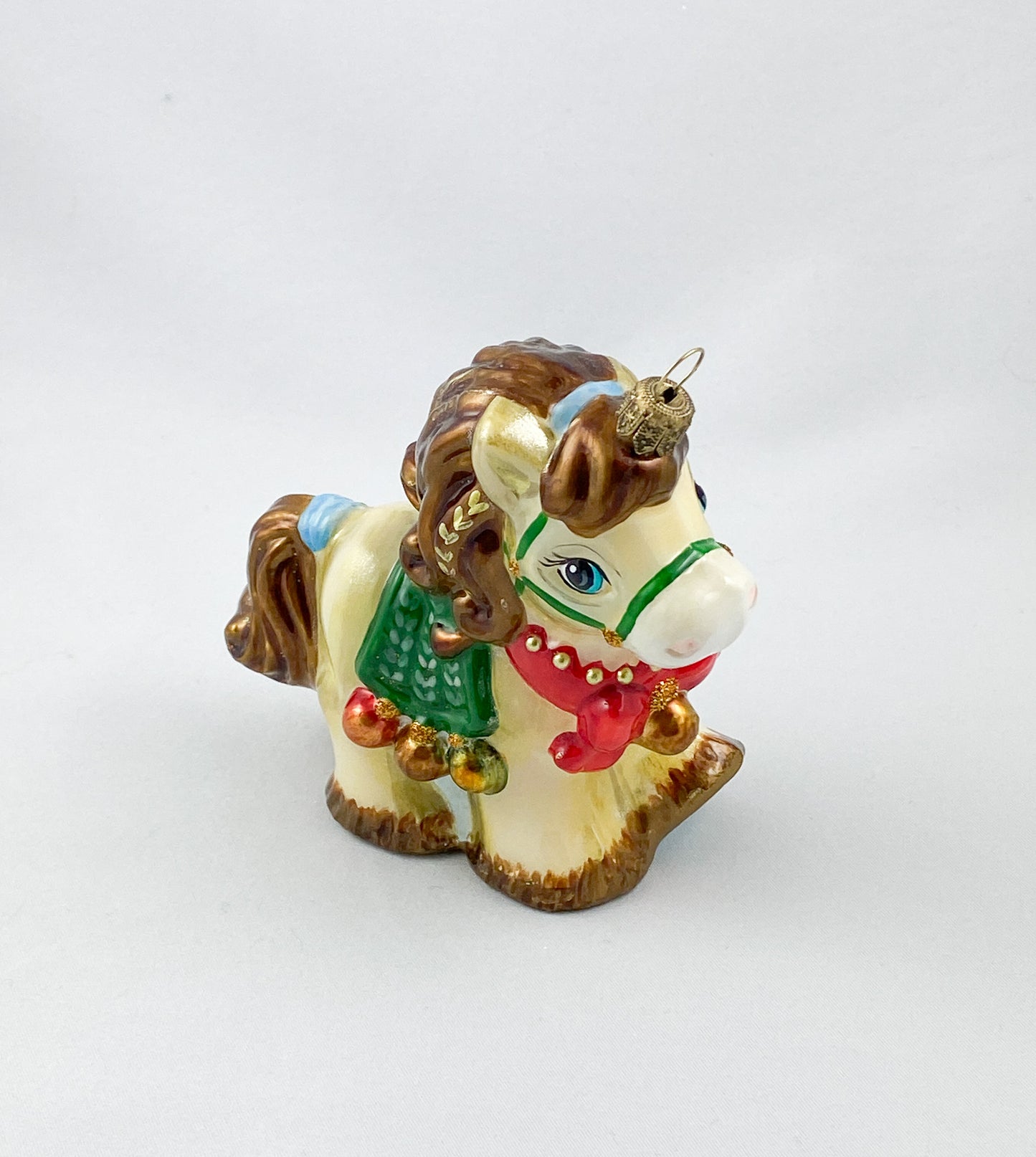 little horse with red ribbon