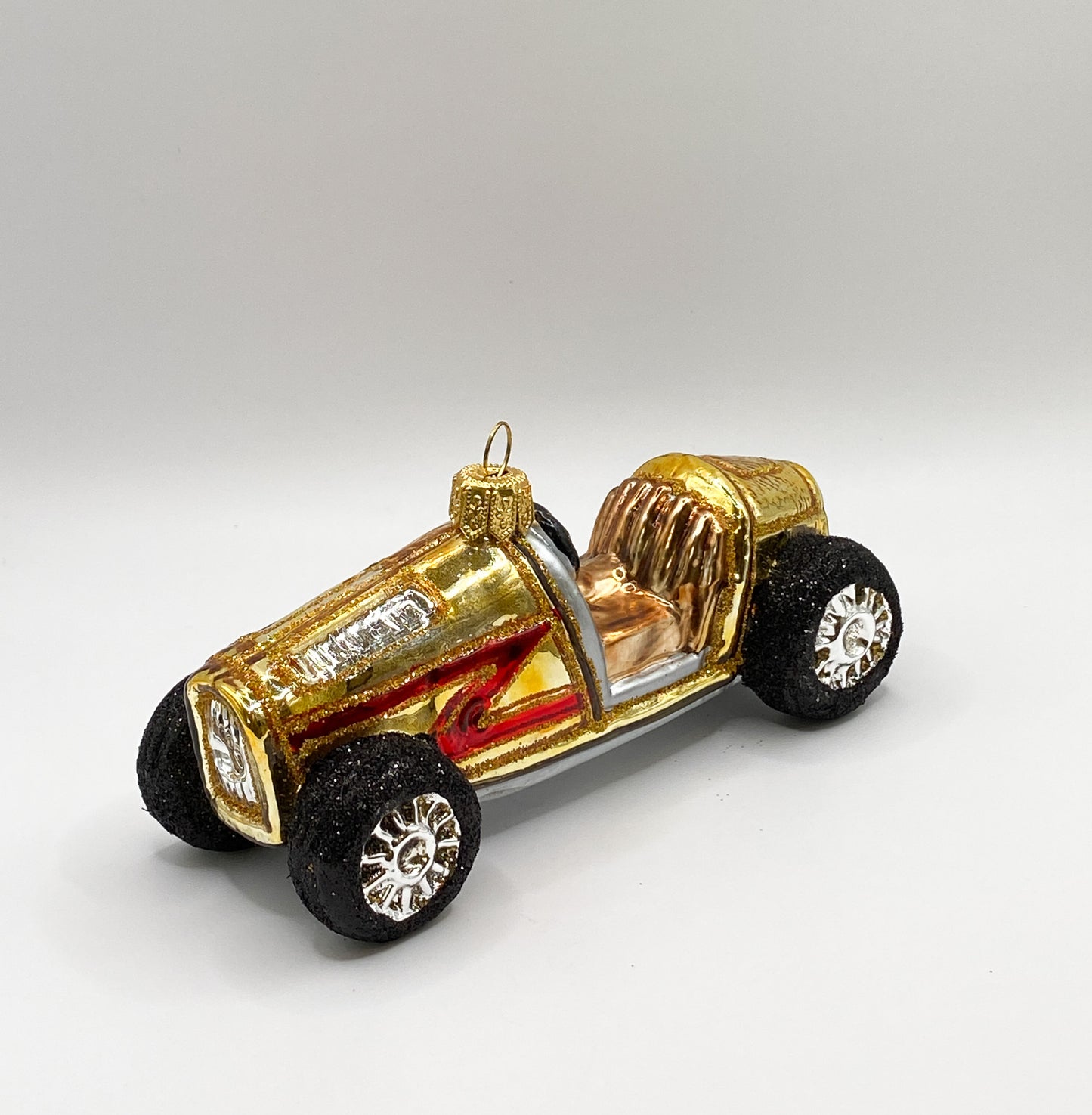 Goldenes Oldtimer Rennauto