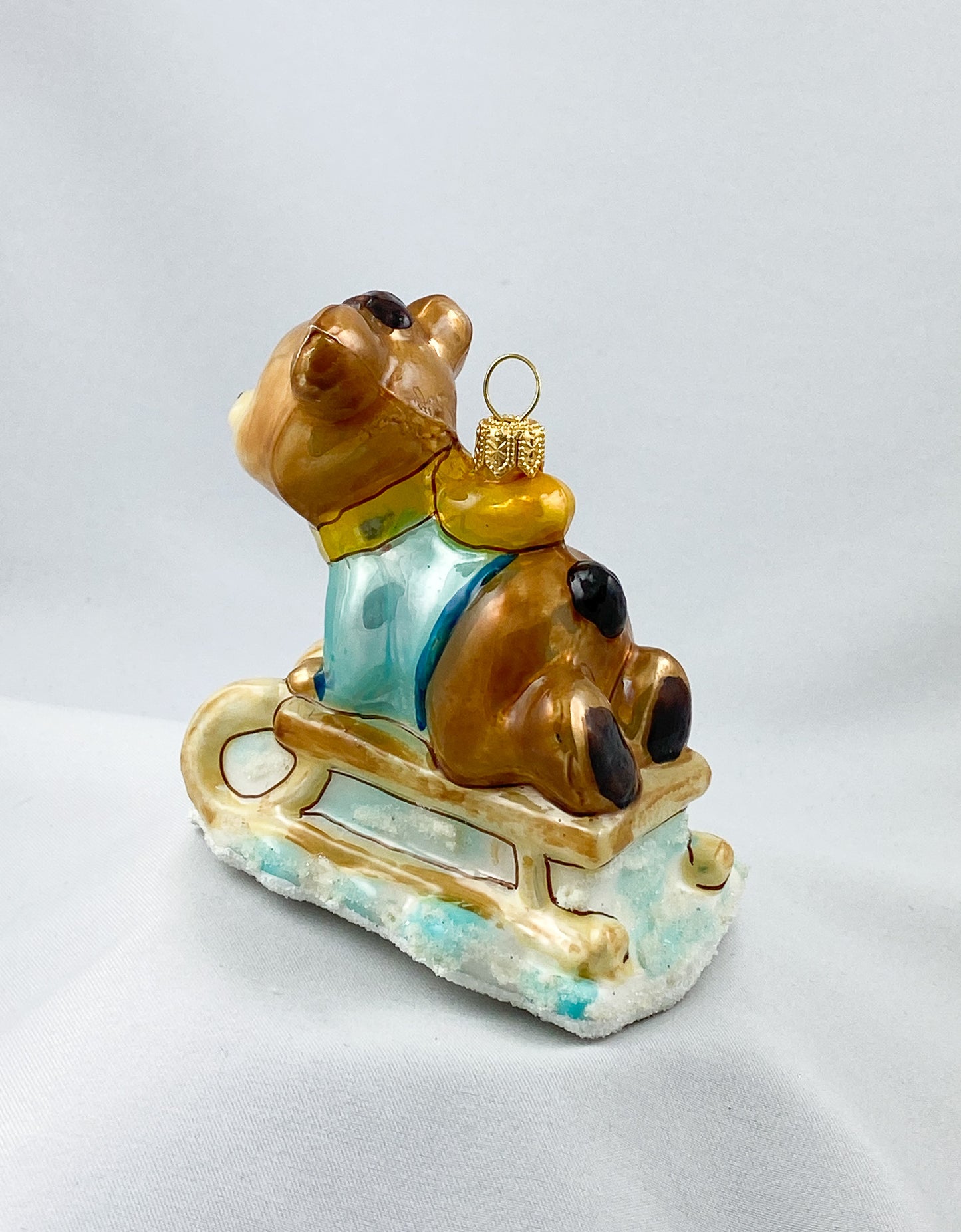 Bär fährt schlitten, KOMOZJA MOSTOWSKI