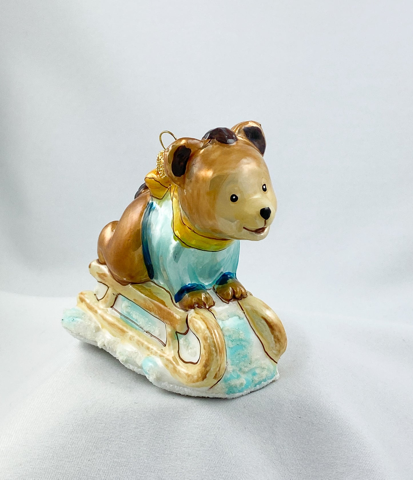 Bär fährt schlitten, KOMOZJA MOSTOWSKI