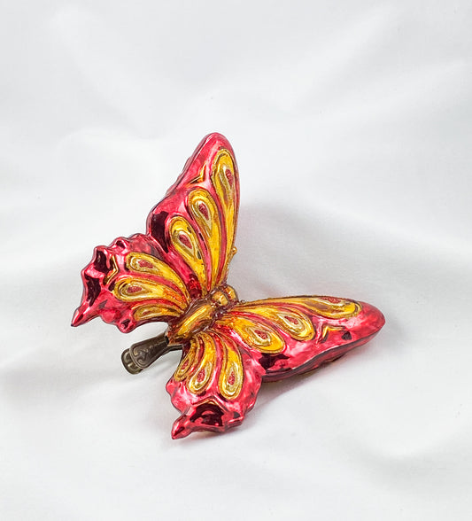 Grosser rot/goldener Schmetterling mit Clip