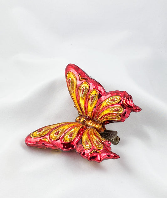 Grosser rot/goldener Schmetterling mit Clip