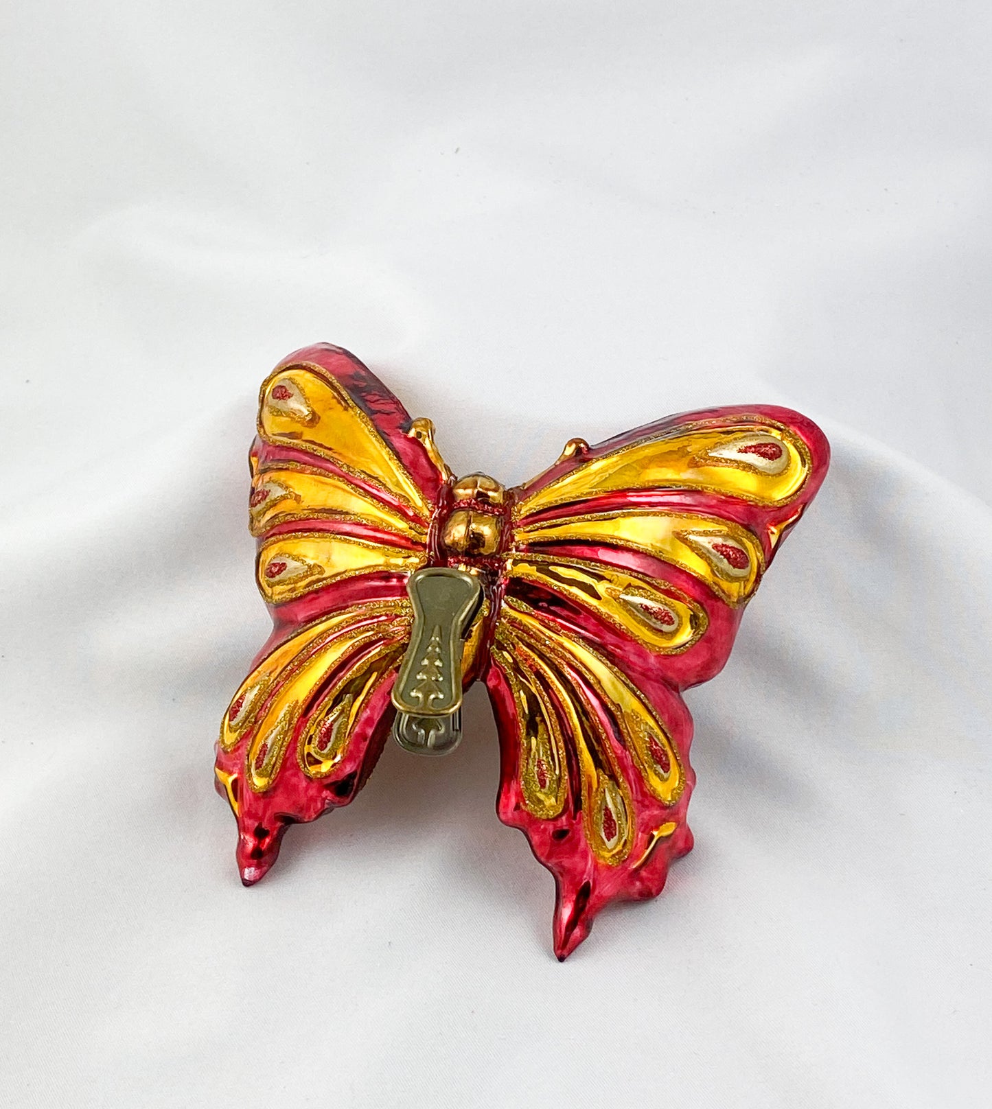 Grosser rot/goldener Schmetterling mit Clip