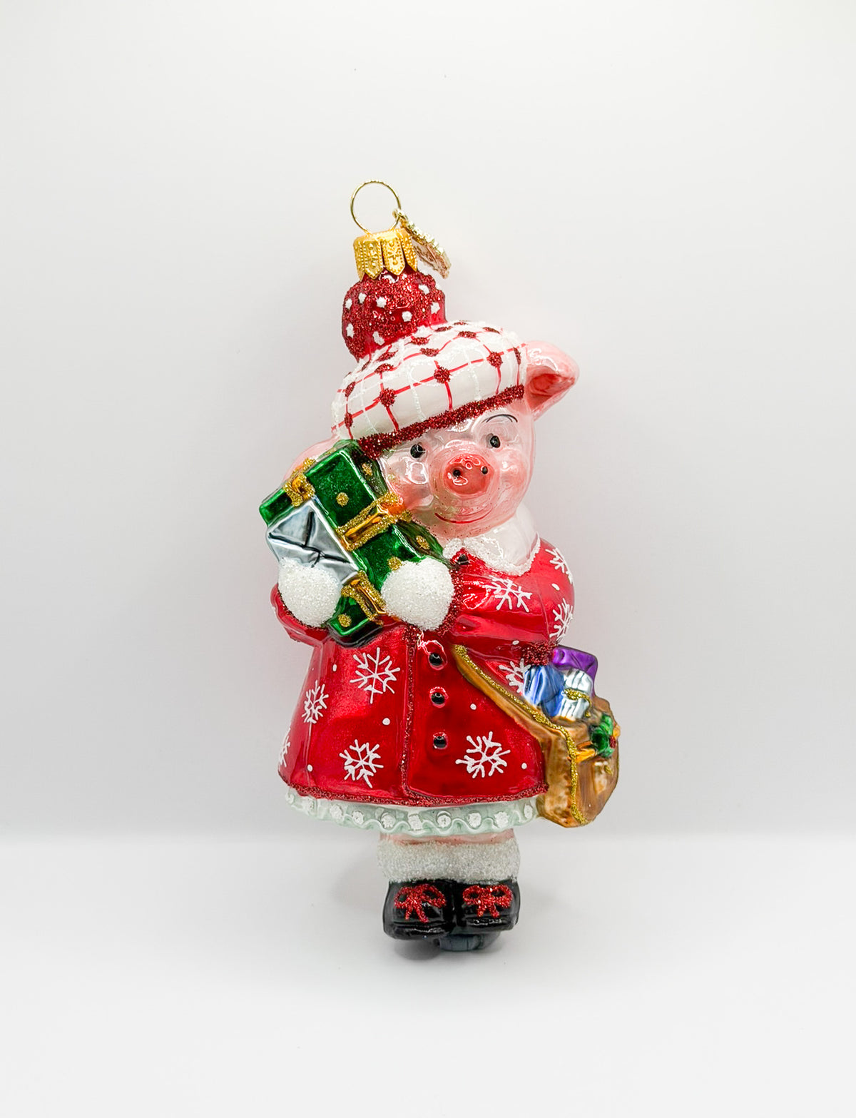 Schweinchen im Winterkleid bei den Weihnachts-Einkäufen