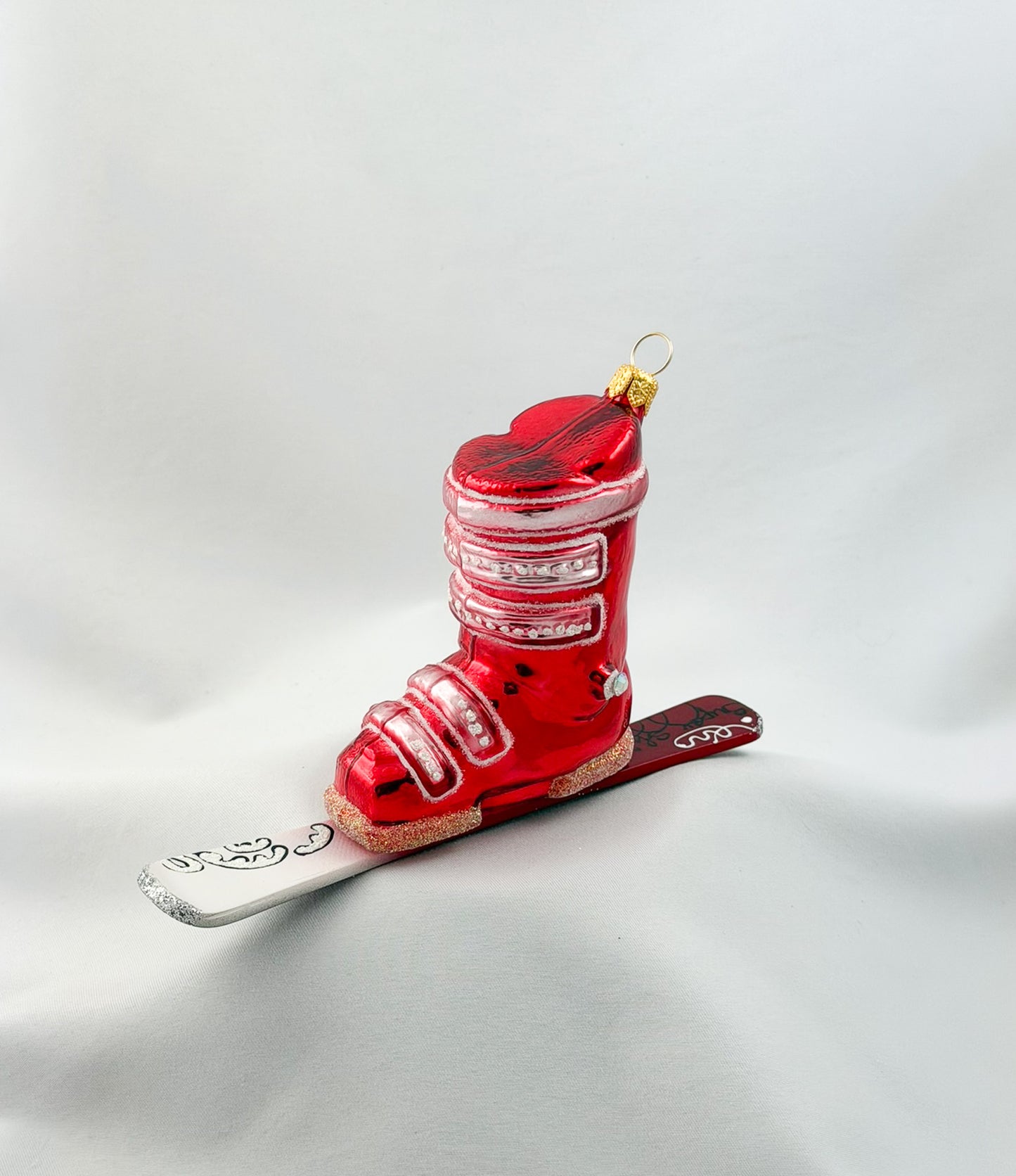 Red Ski Boot with Ski
