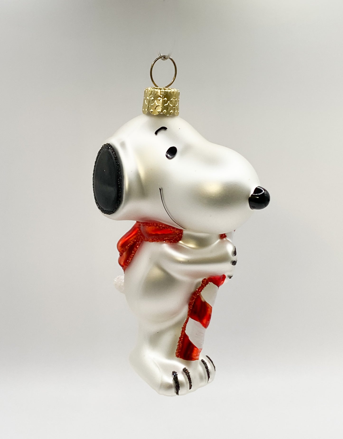 Snoopy loves his candy cane