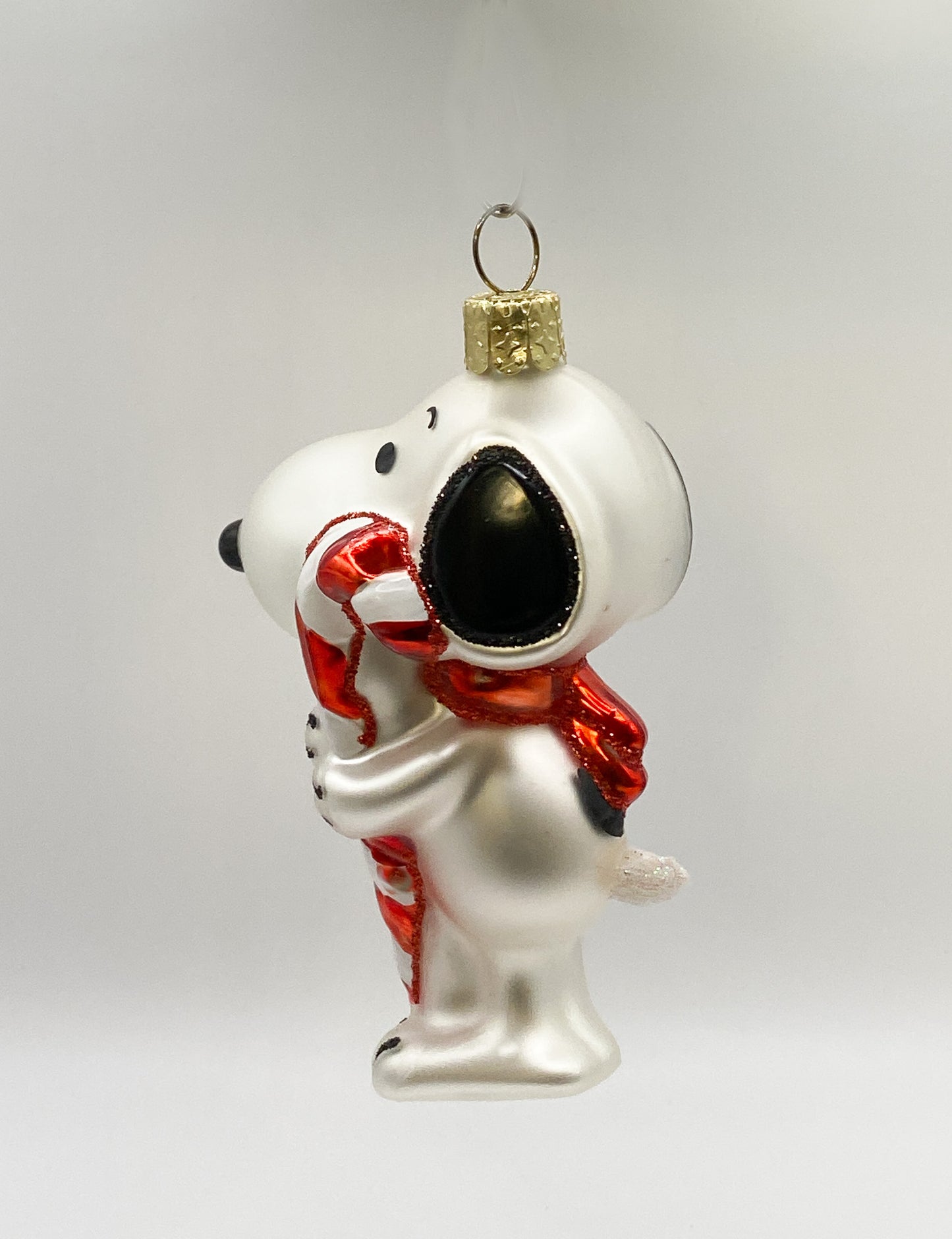 Snoopy loves his candy cane