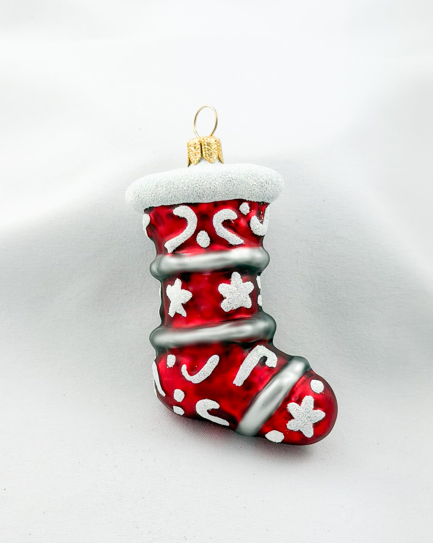 Large red Christmas stocking with star decorations