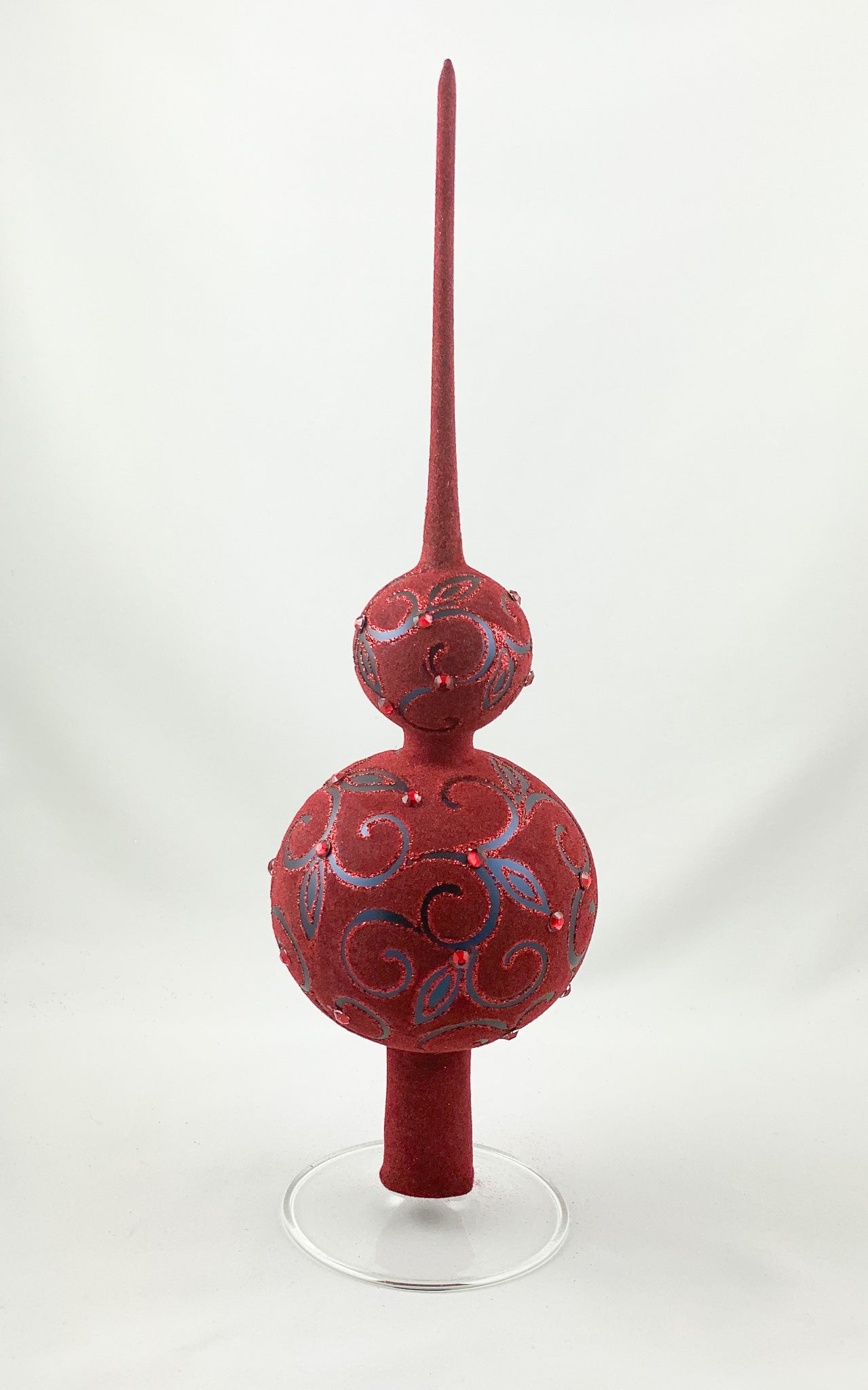 Velvety dark red Christmas tree topper with tendril motif