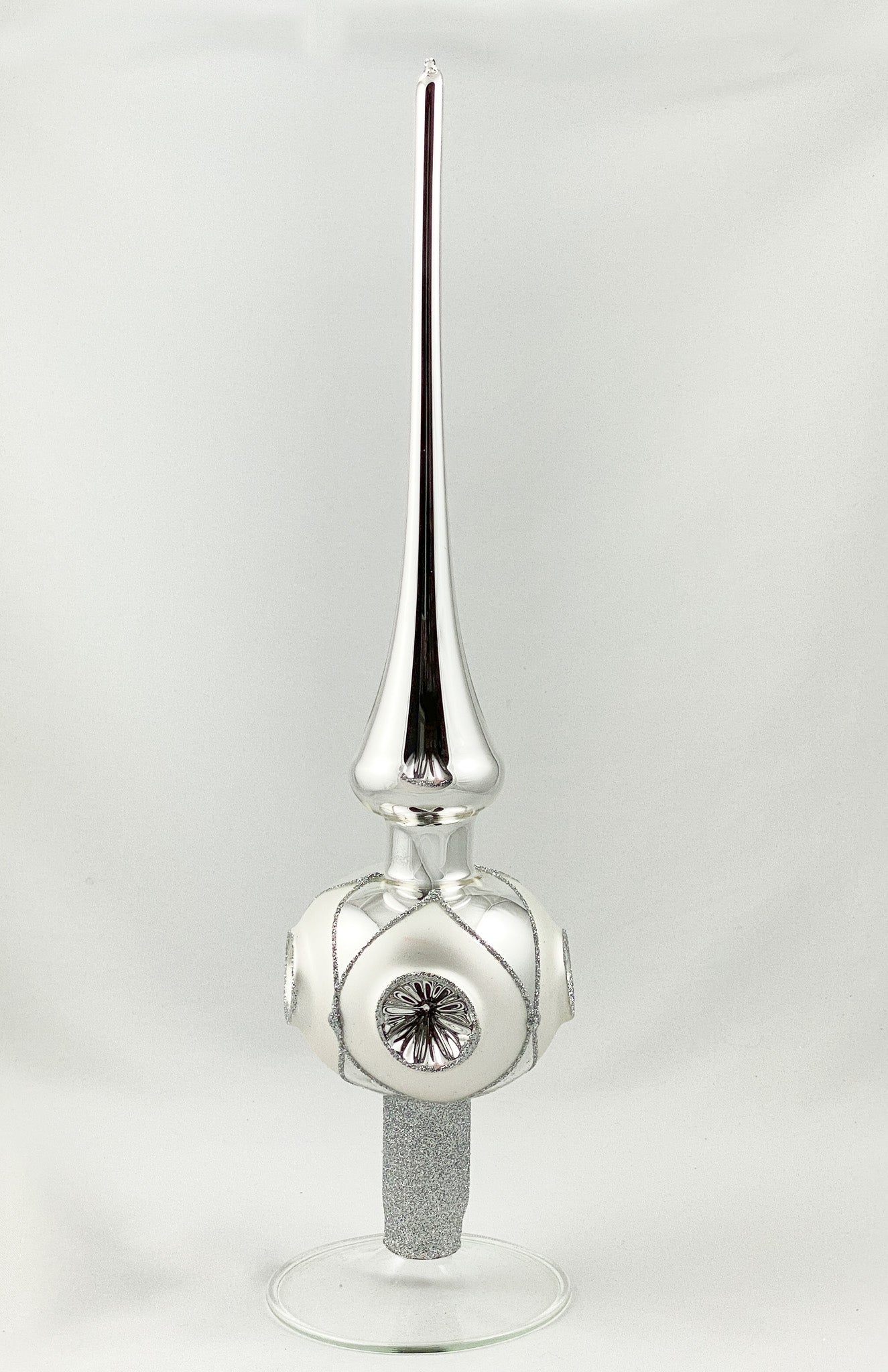 Silver Christmas tree topper with 4 reflex