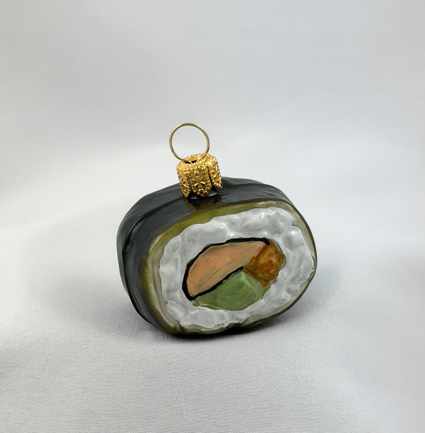 Sushi-Stück mit Gurke
