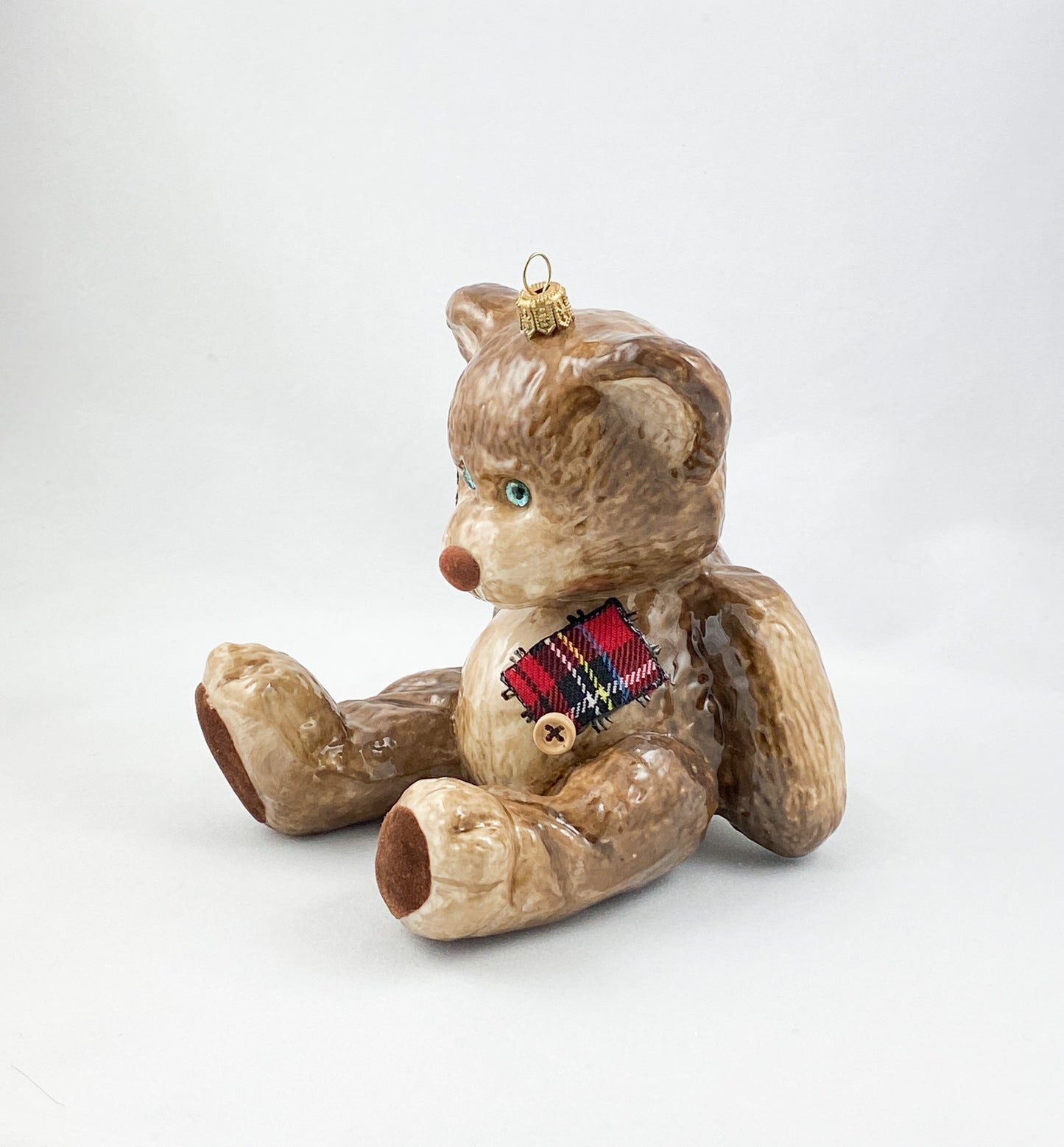 Brown teddy bear with fabric patches AtlasArt