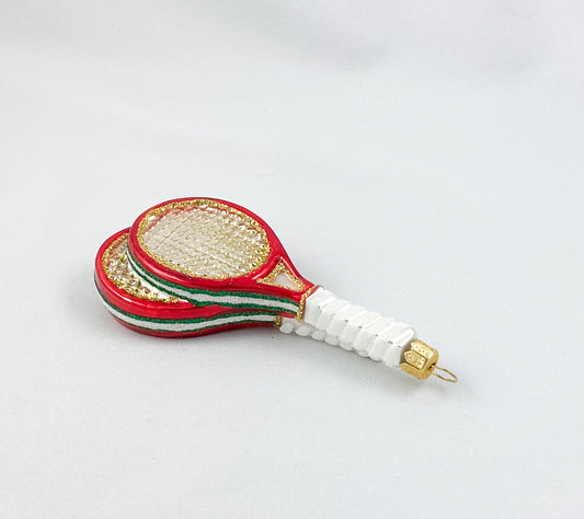 Tennisschläger mit gelbem Ball