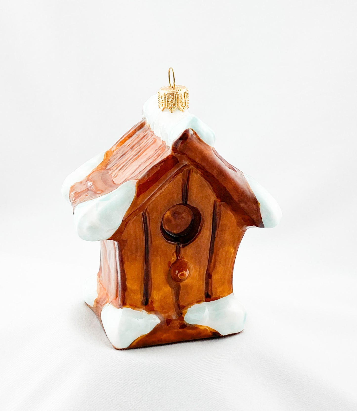 Verschneites Vogelhäuschen KOMOZJA MOSTOWSKI