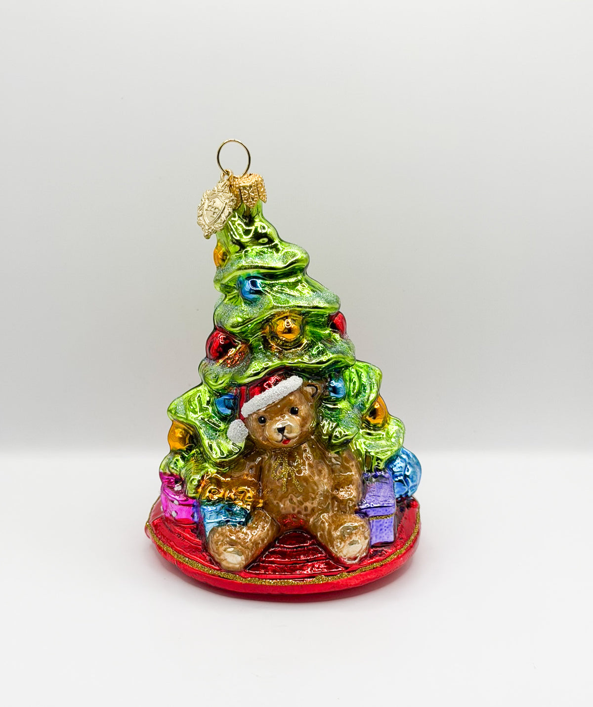 Kleiner Christbaum mit braunem Teddybär