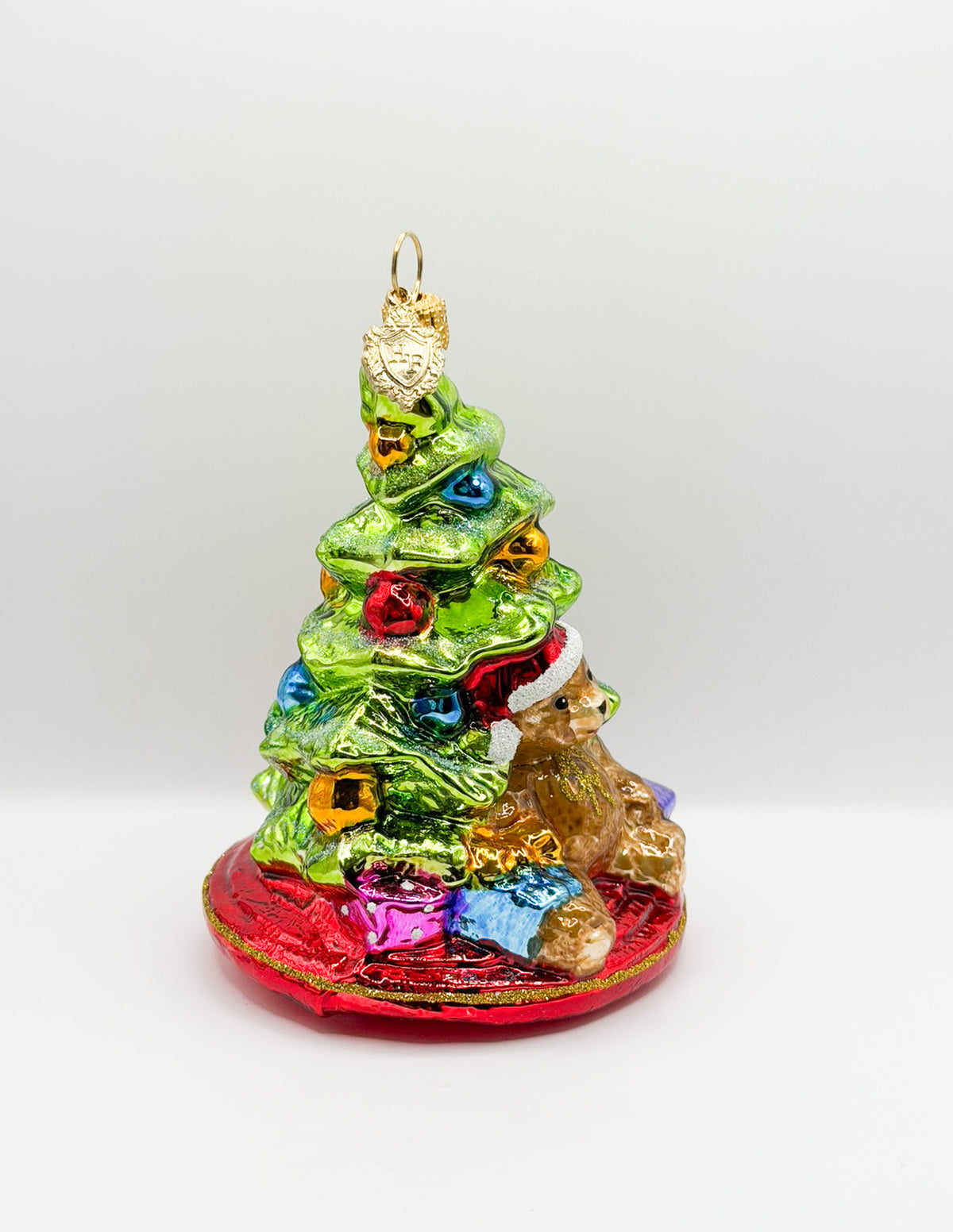 Kleiner Christbaum mit braunem Teddybär